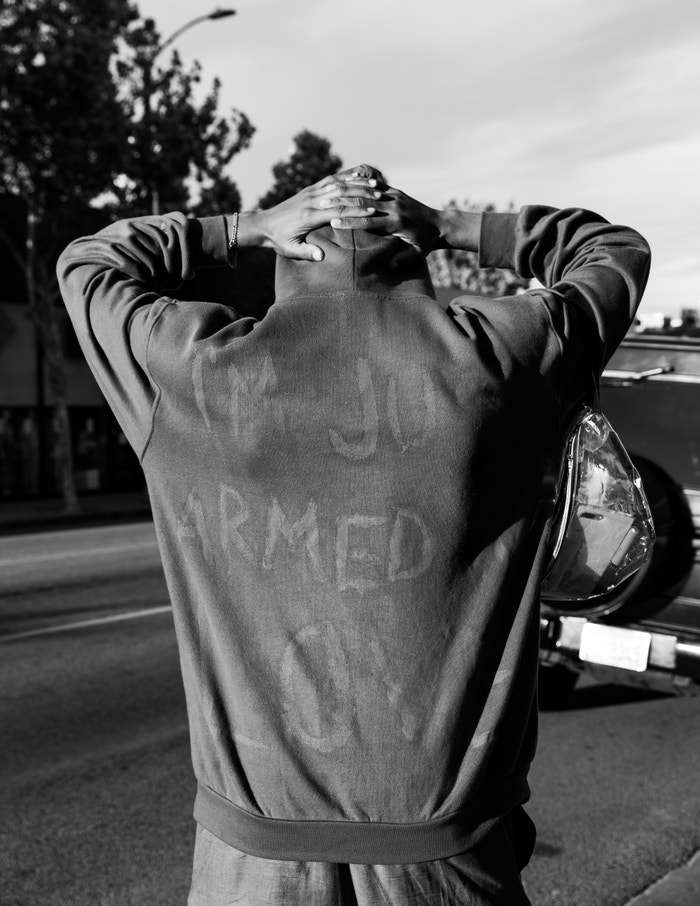 30 May 2020. A peaceful protester wearing a jumper saying, “I’m just armed with love” at the Black Lives Matter protest, Los Angeles. Autor: Alexis Hunley