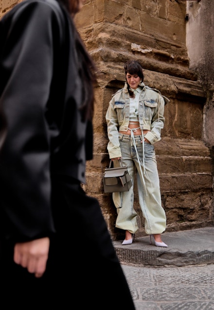 Oversized denim trousers and denim jacket, Off-White (VIA LUISA VIA ROMA); cropped-top mint, Christopher Esber (VIA LUISA VIA ROMA); Bag, Boyy; Shoes, Jimmy Choo