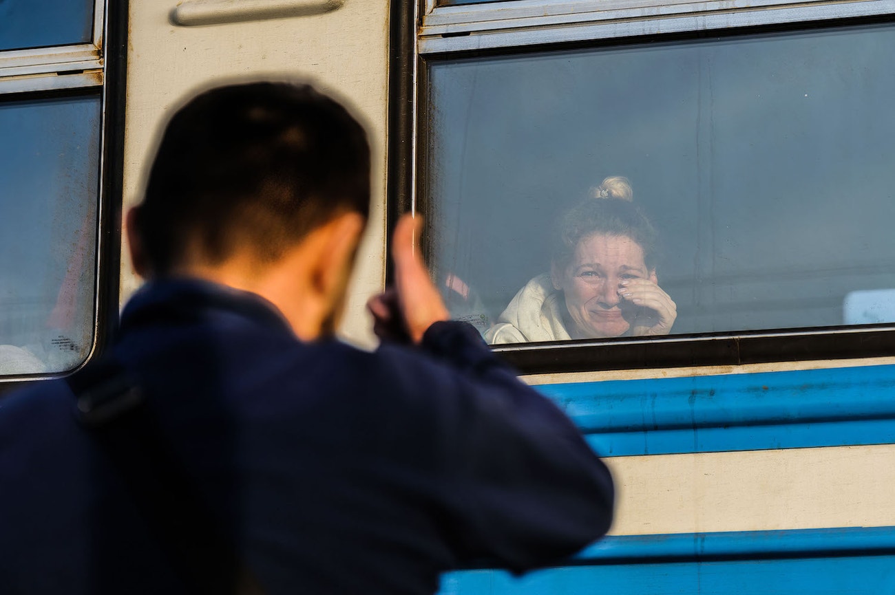 Žena opouštějící Lvov, 15. března 2022