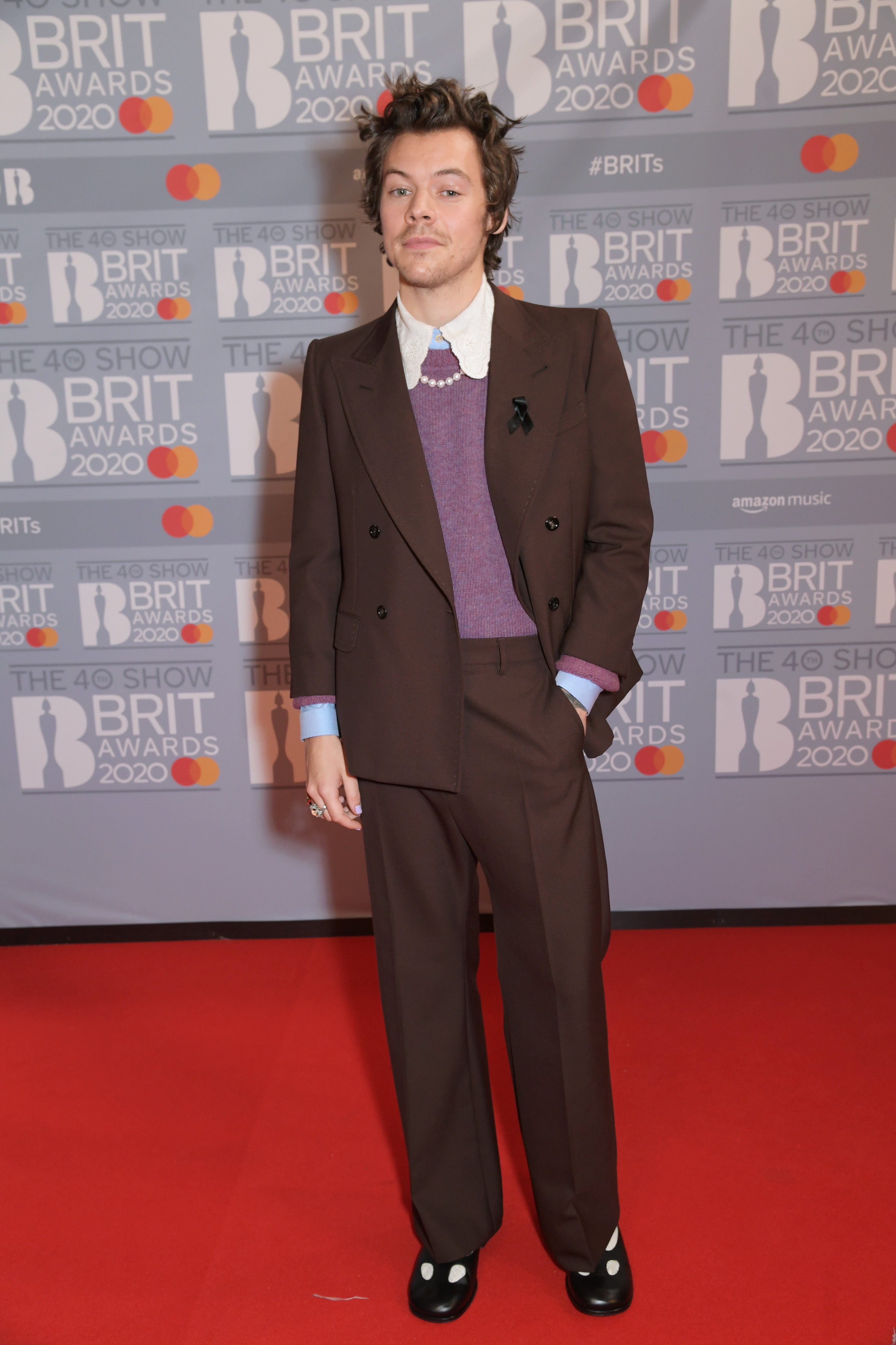 Harry Styles v Gucci Autor: David M. Benett/Dave Benett/Getty Images